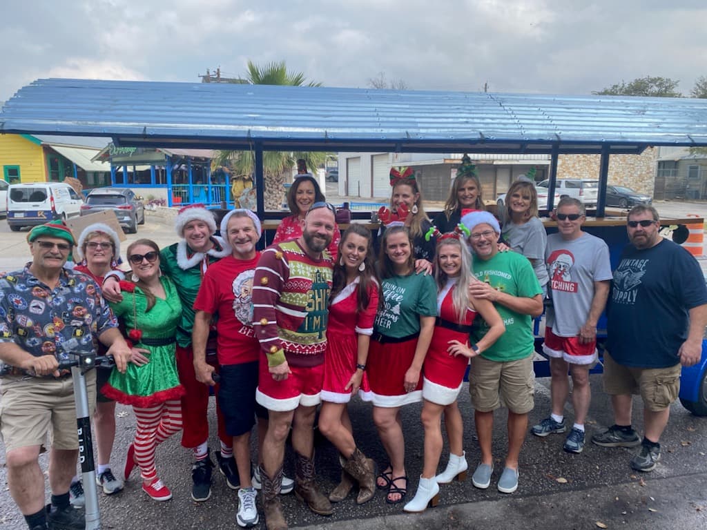 Holiday Christmas party group ride on Austin Bar Bike with festive decorations